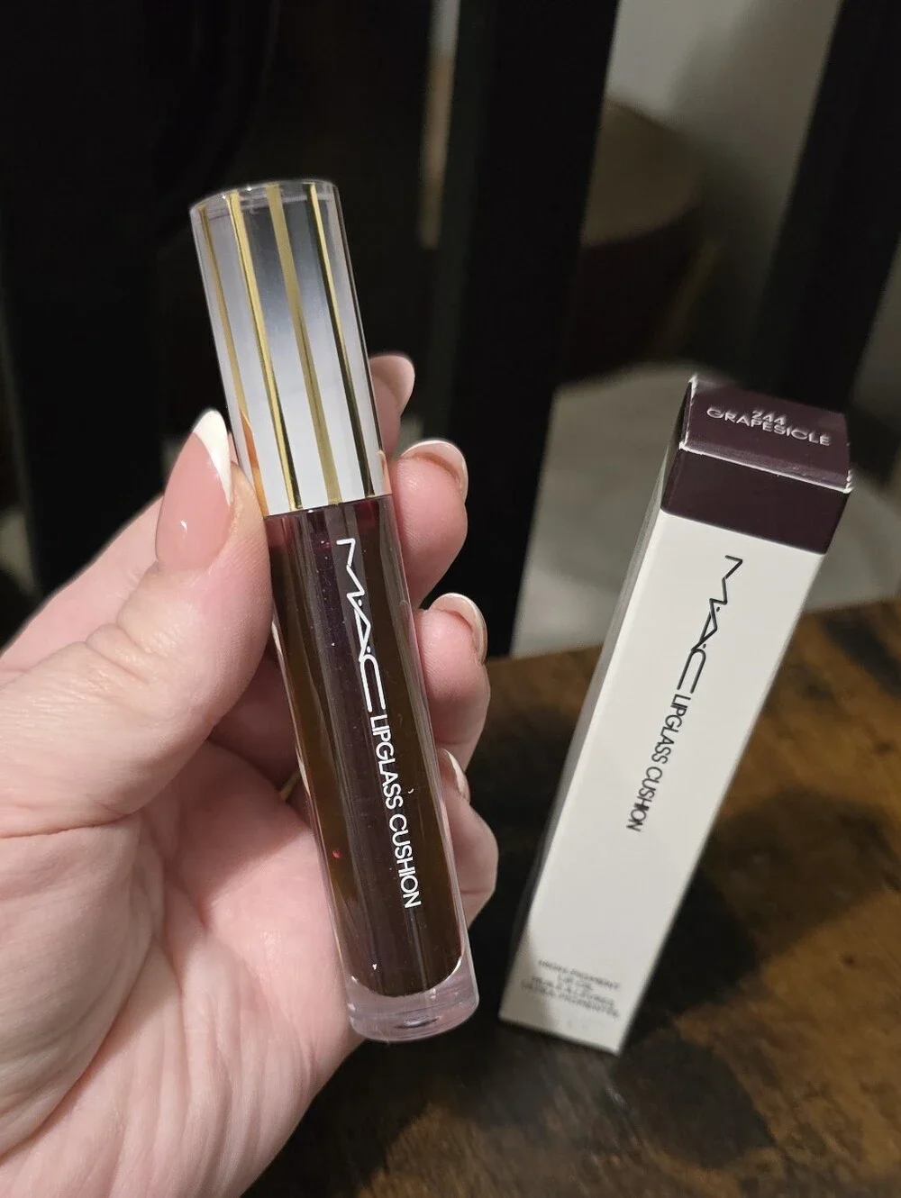 Sold.     MAC Cosmetics Lipglass Cushion Lip Oil
